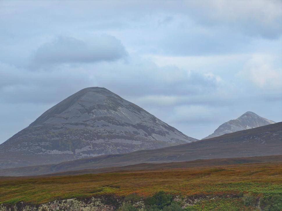 Free Image of Majestic Mountain Landscape Under Cloudy Skies 