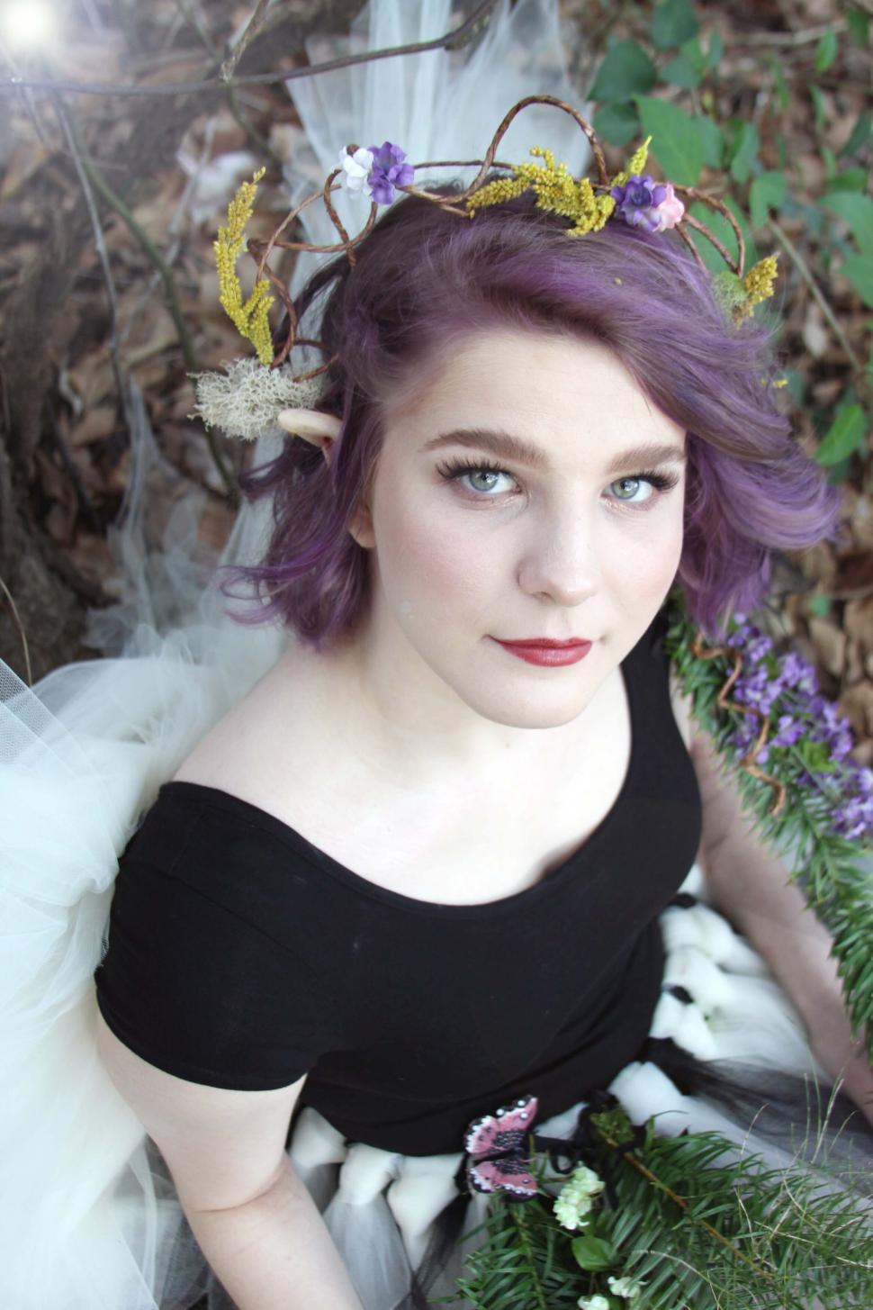 Free Image of Fantasy-themed portrait of woman in woods 