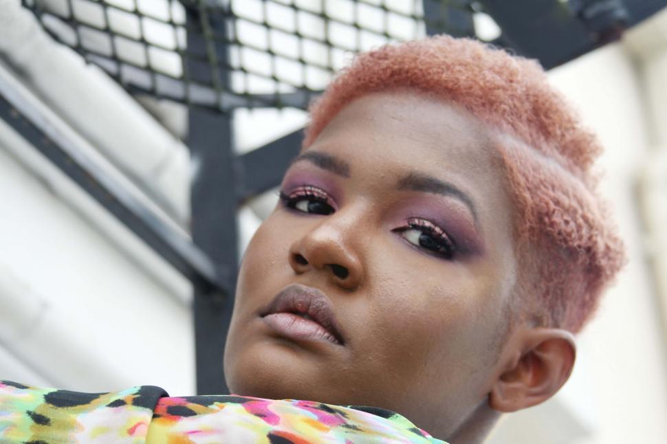 Free Image of Bold portrait of woman with colorful makeup 