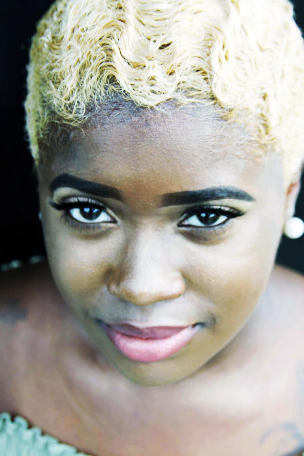 Free Image of Portrait of a woman with golden hair 