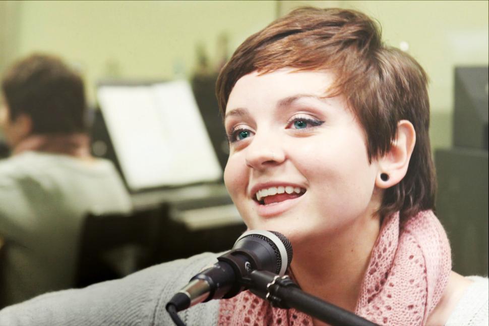 Free Image of Young female singer performing live 