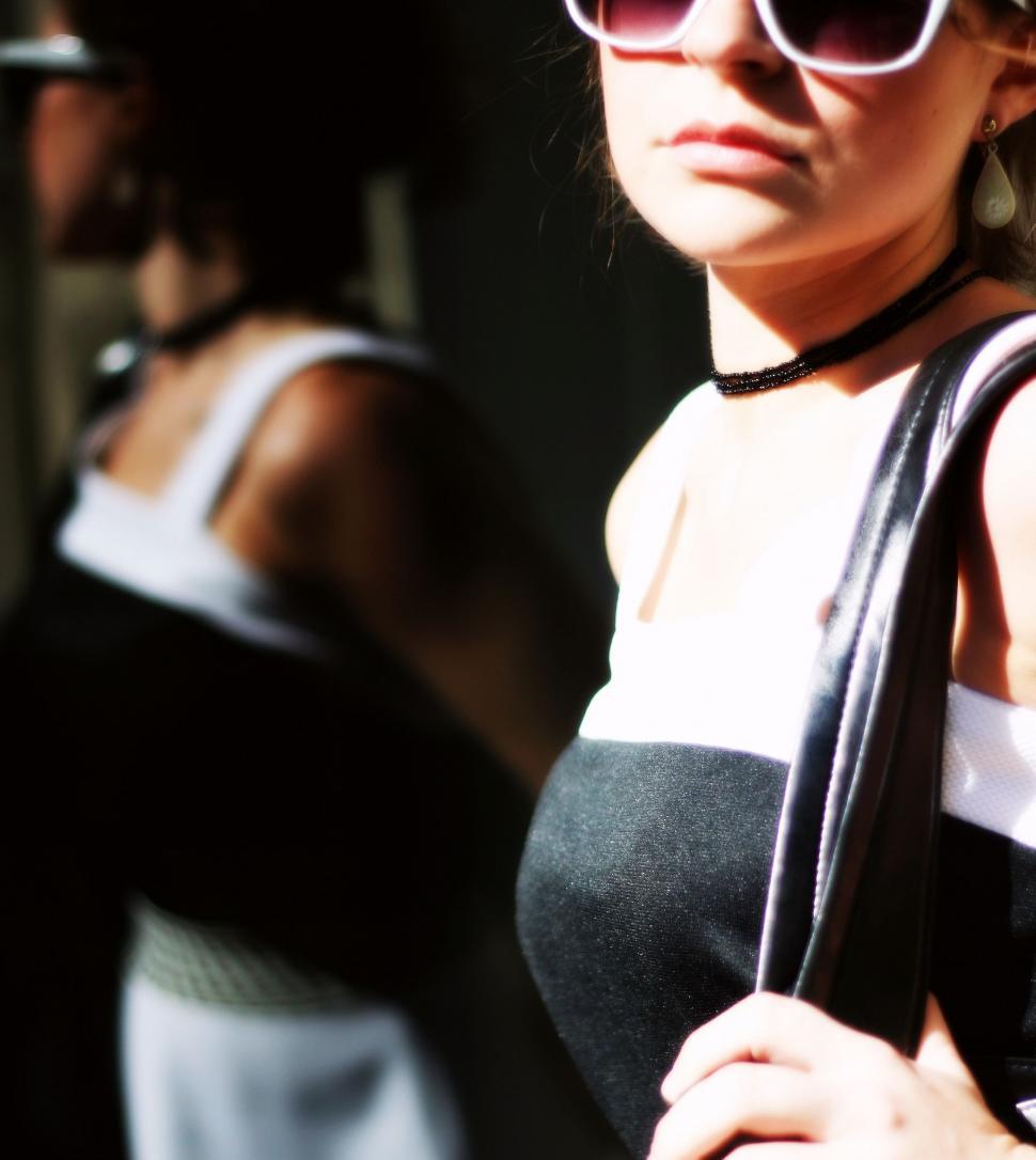 Free Image of Artistic fashion shot with woman and mirror 