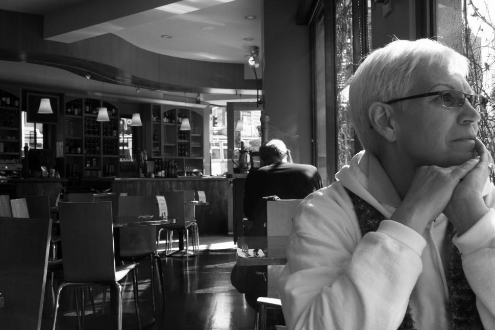 Free Image of Blurred person in a solemn cafe setting 