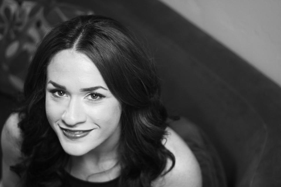 Free Image of Black and white portrait of smiling woman 