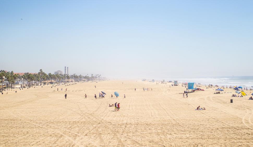 Free Image of Sunny day at a spacious sandy beach 