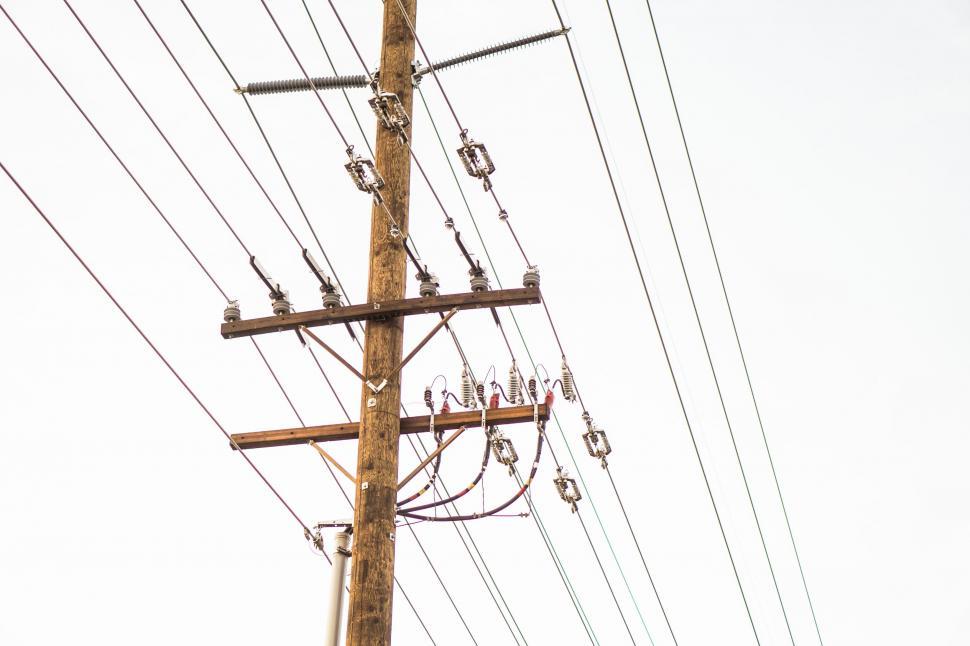 Free Image of Electricity pole with wires against sky 