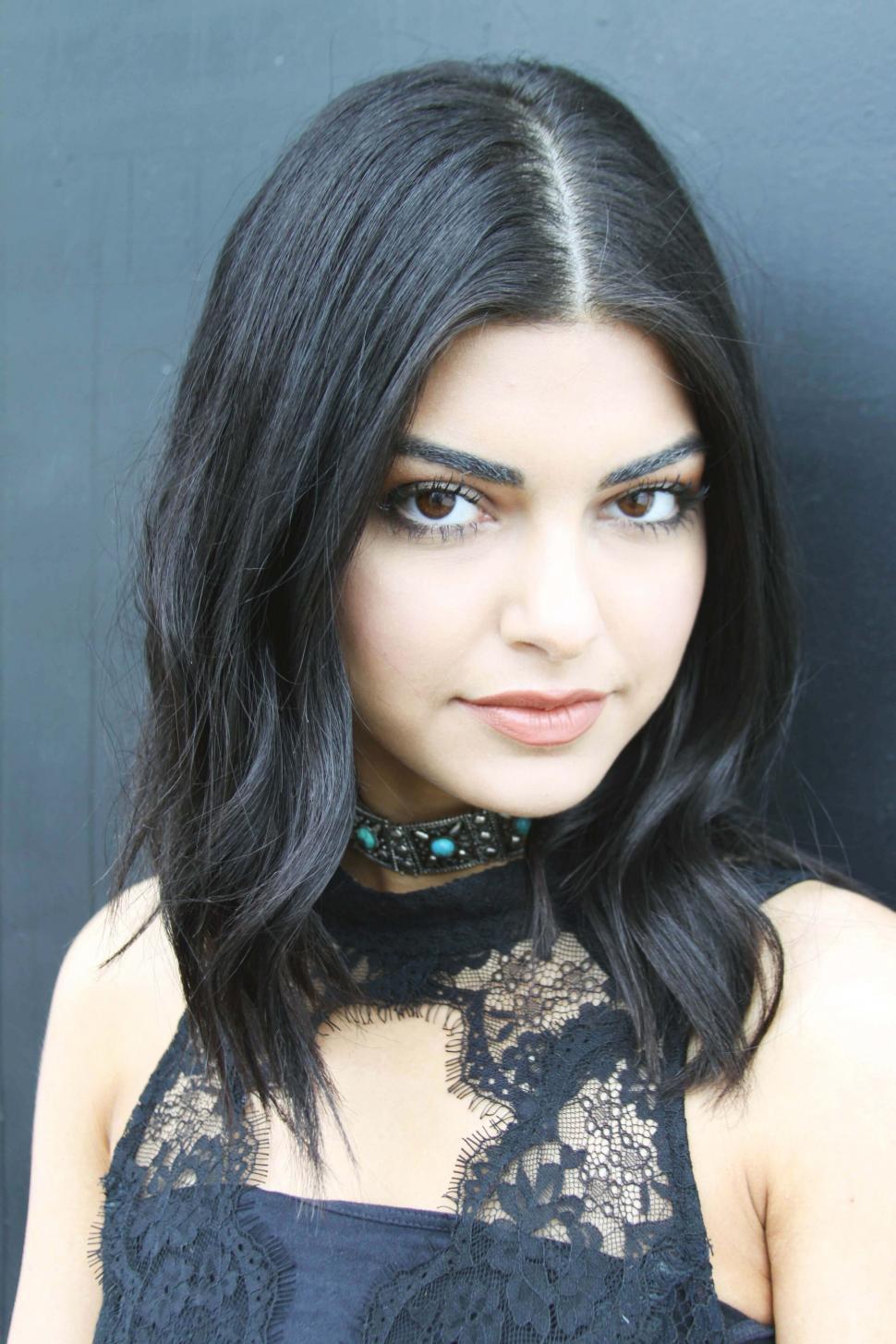 Free Image of Portrait of a woman with sleek hair 