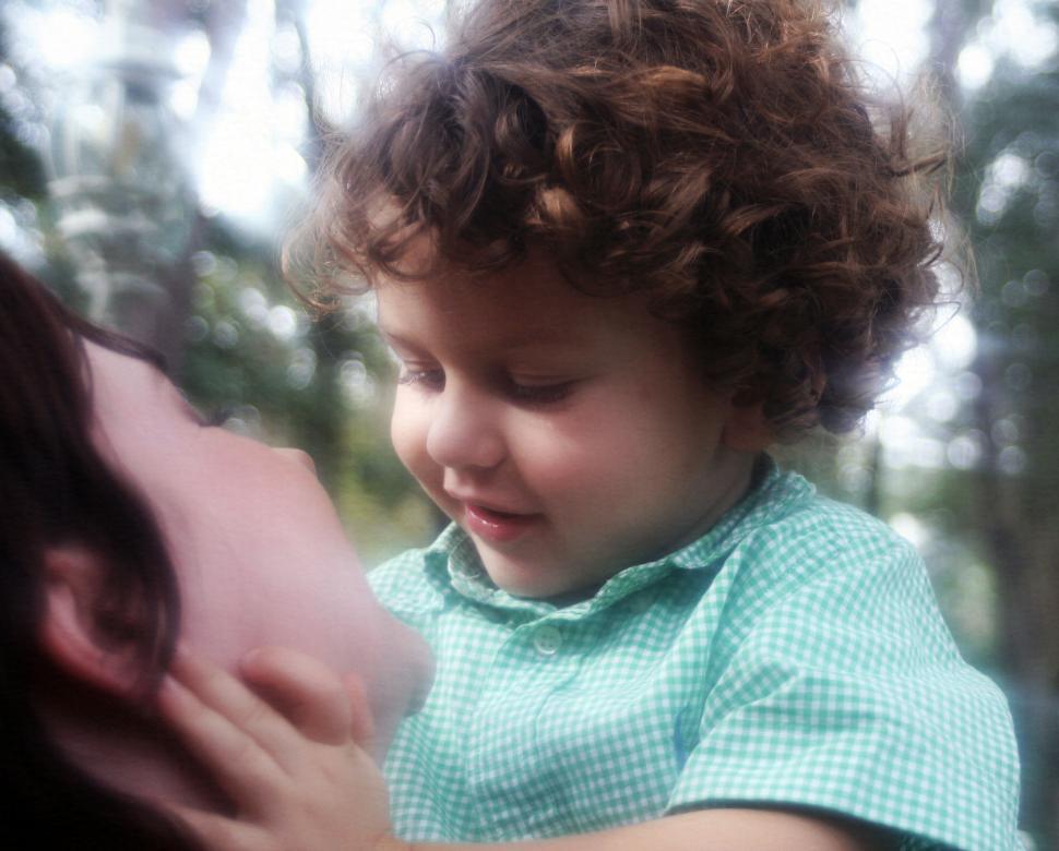Free Image of Mother enjoys playing with her playful young child 