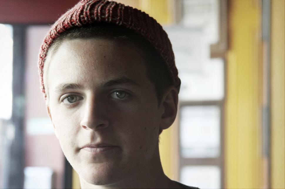 Free Image of Young man with beanie facing camera 