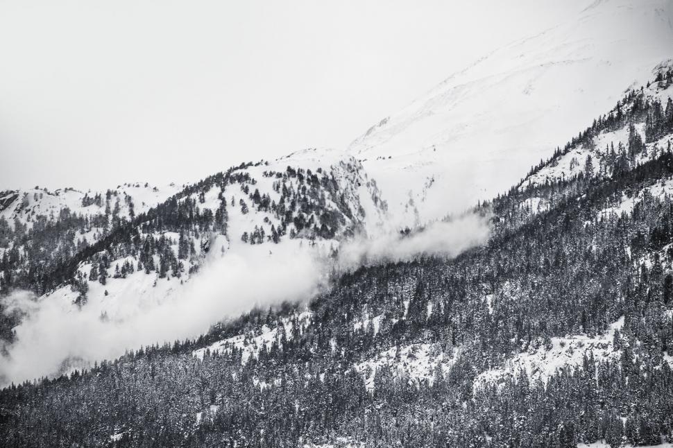 Free Image of Snowy mountain landscape with clouds 