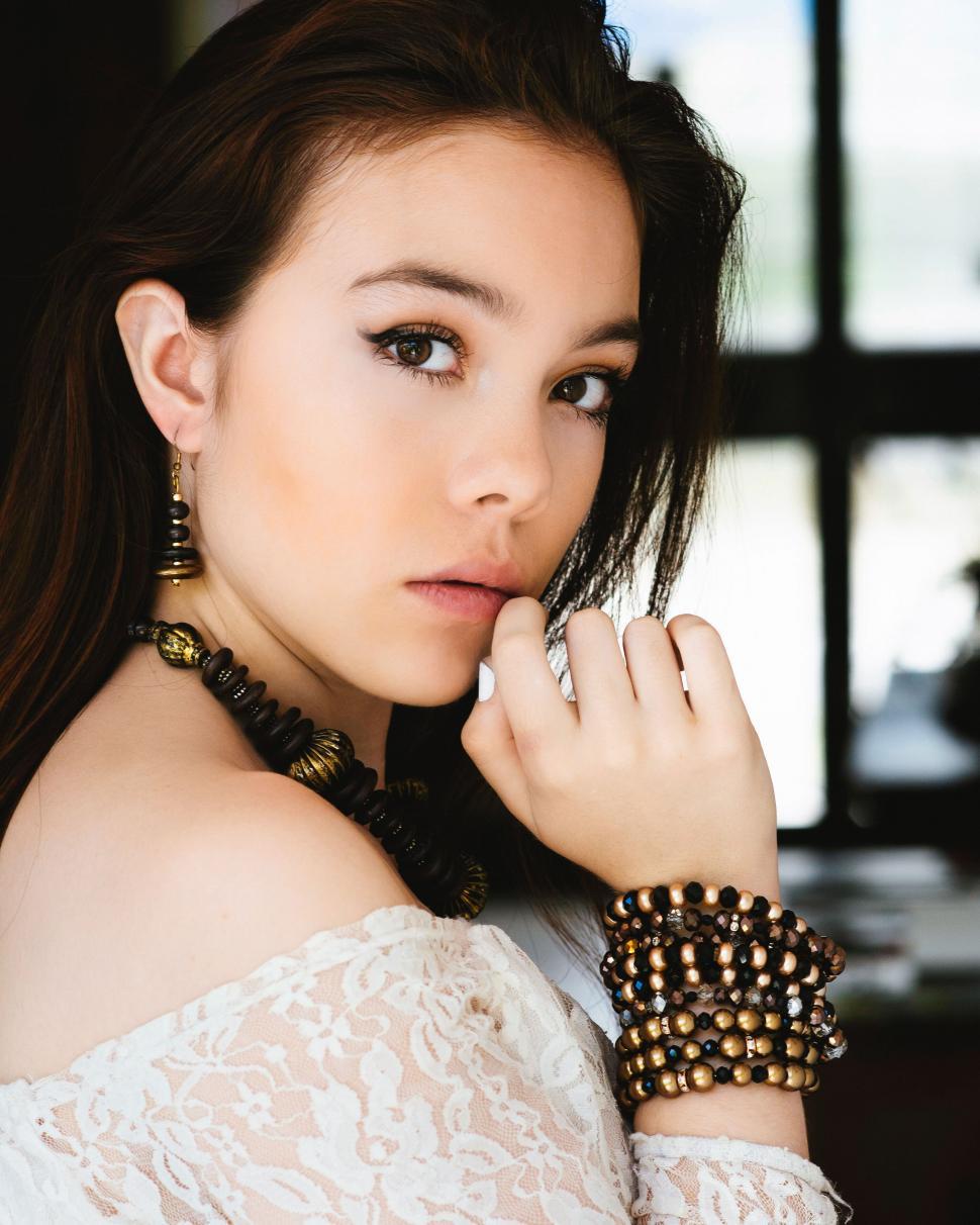 Free Image of Elegant woman with thoughtful expression 