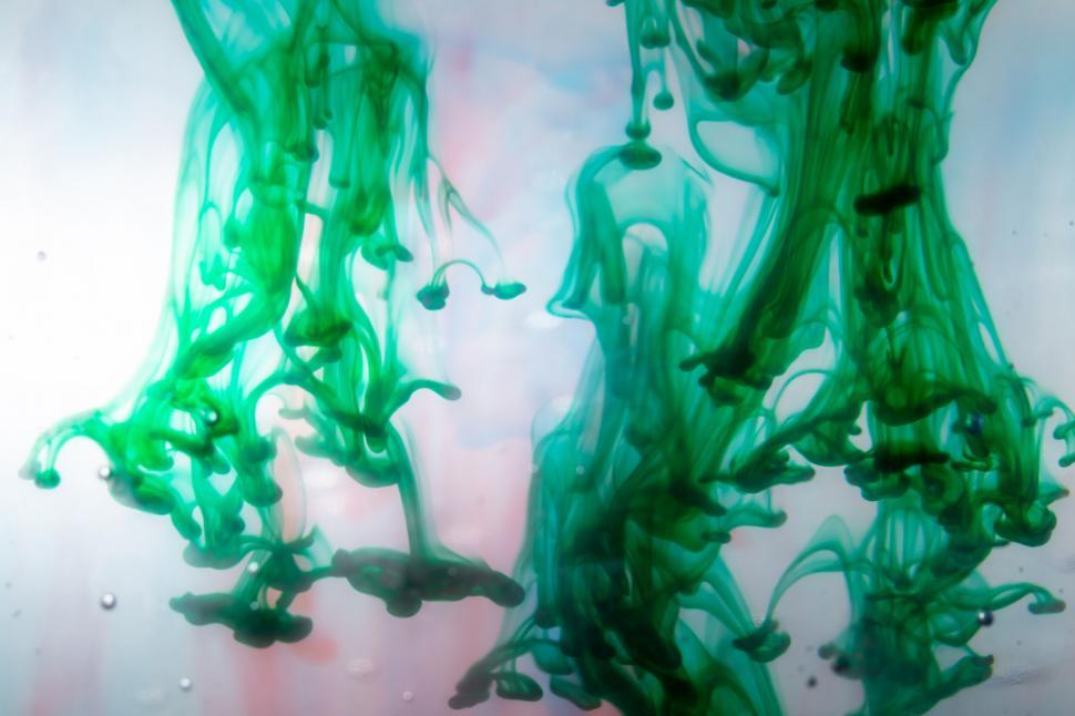 Free Image of Abstract green ink patterns in water 