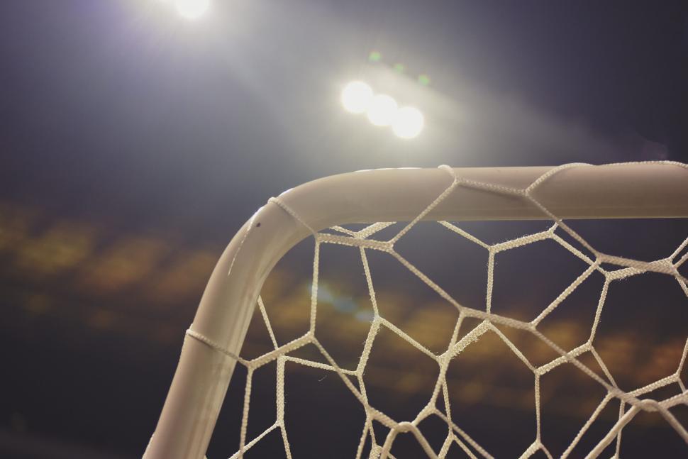 Free Image of Goalpost with stadium lights at twilight 
