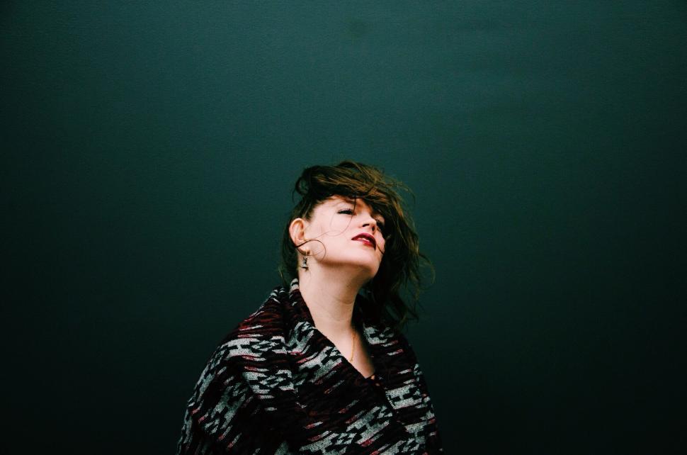 Free Image of Woman with dramatic pose and outfit 