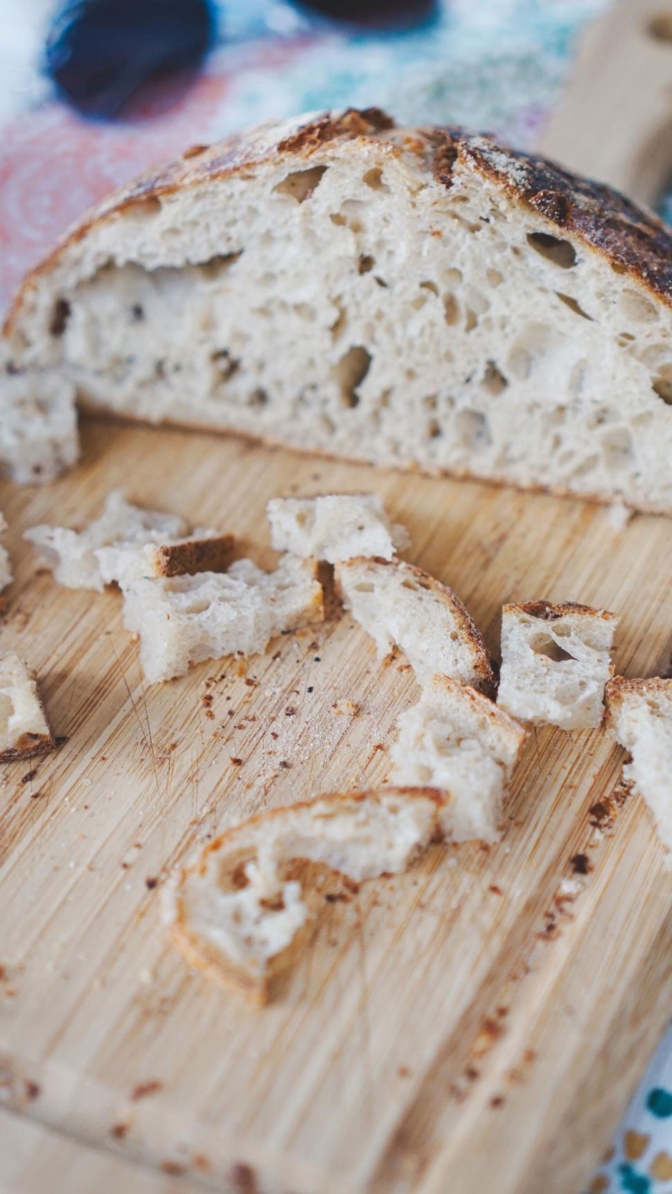 Free Image of Artisan bread on a wooden board 