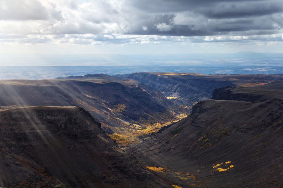Free Image of Majestic mountain vista under dramatic skies 