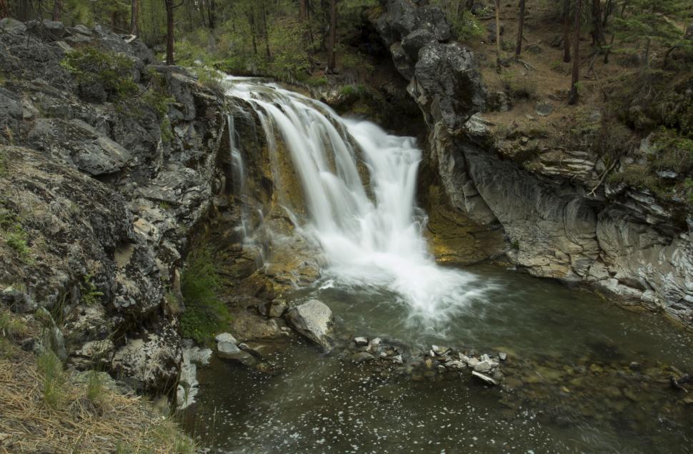 Free Image of Serene Waterfall in Forest Landscape 