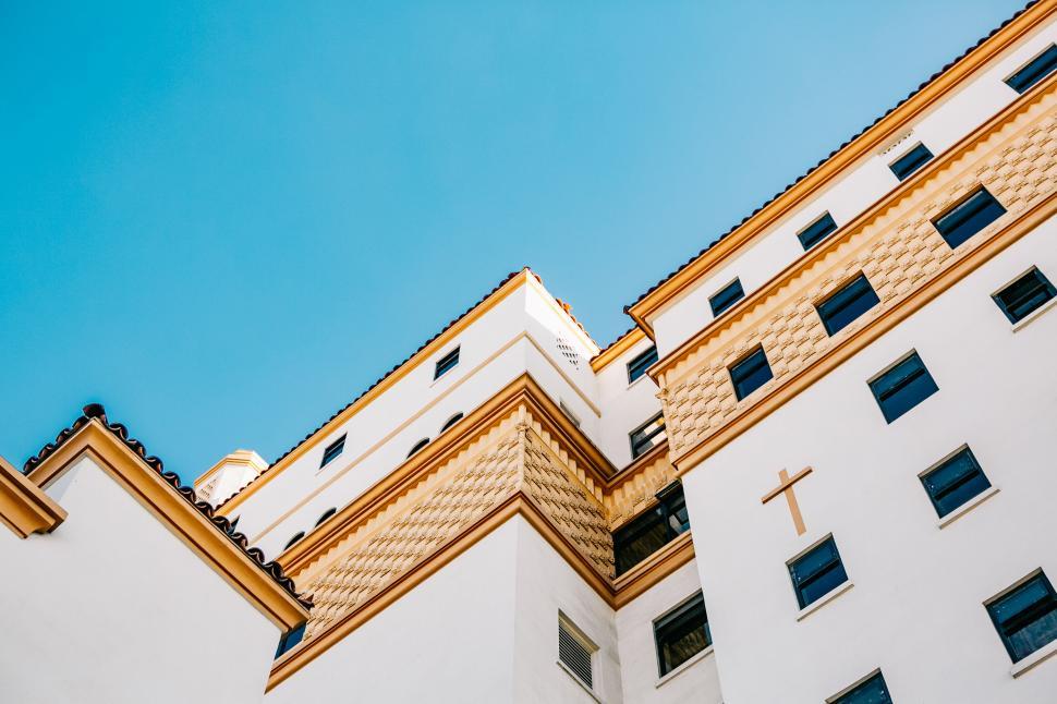 Free Image of Modern architecture under a clear blue sky 