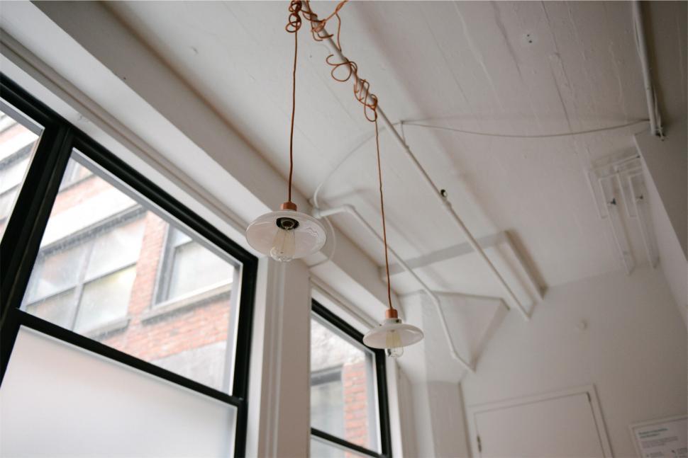 Free Image of Cozy pendant lights in a modern space 