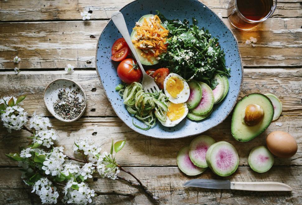 Free Image of Freshly prepared salad on rustic wooden table 