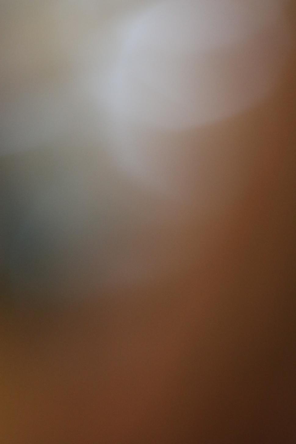 Free Image of Blurred abstract warm toned backdrop 