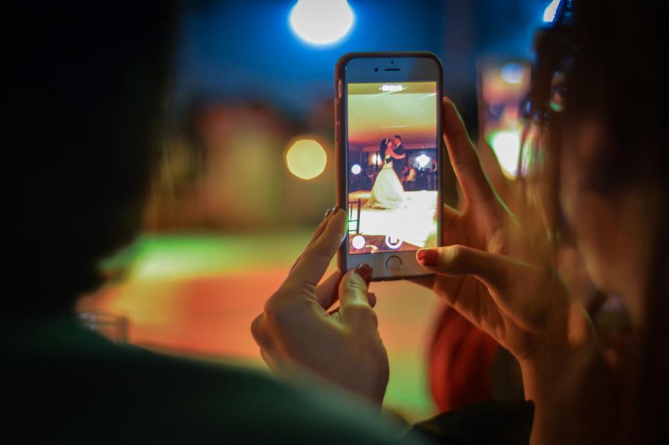 Free Image of Capturing a dancer on phone during a performance 