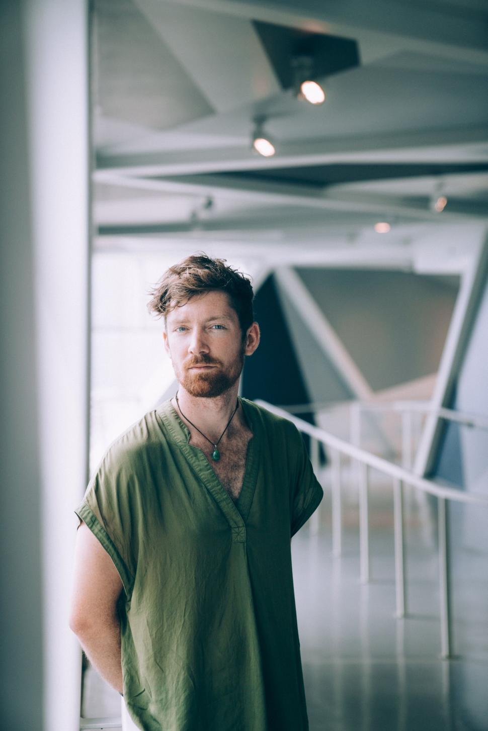 Free Image of Bearded man in a casual green shirt 