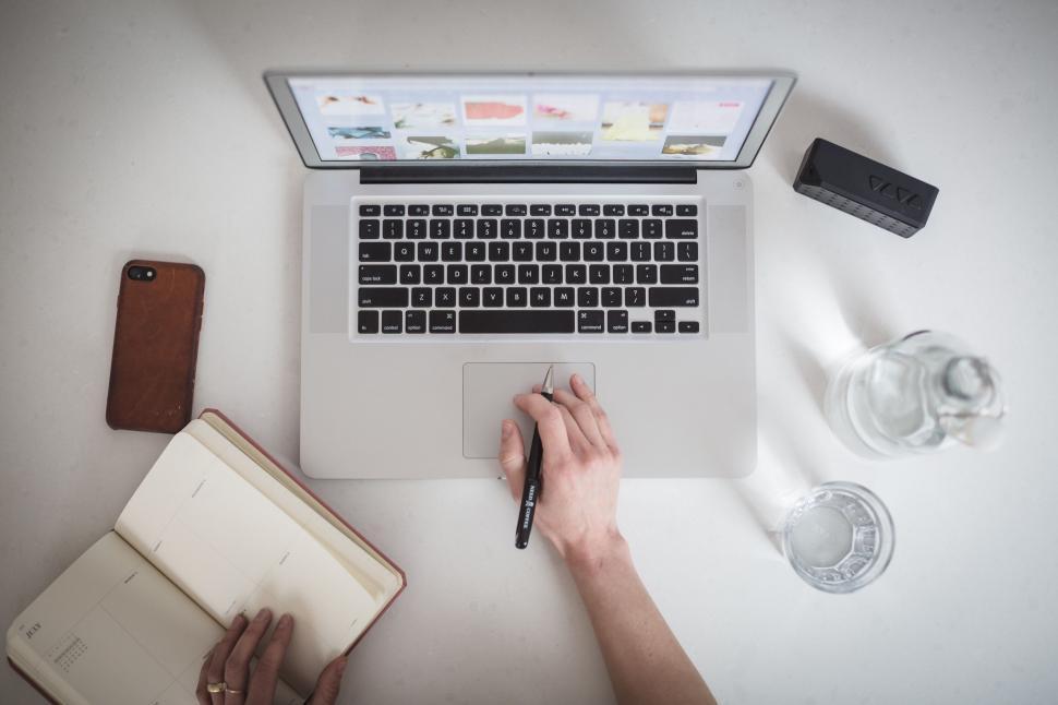Free Image of Top view of workspace withdifferent items placed on table 