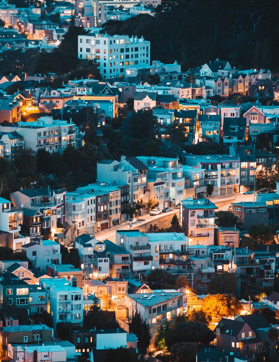 Free Image of Twilight cityscape with illuminated buildings 