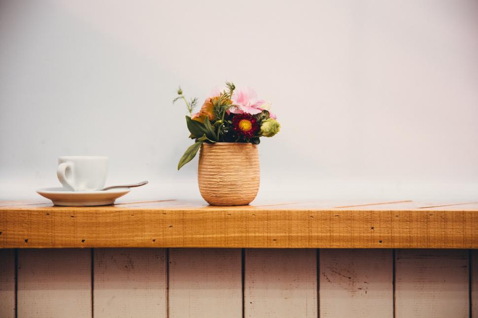 Free Image of Floral arrangement on wood ledge 