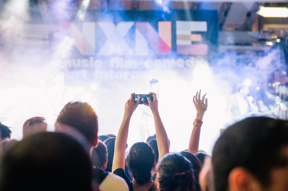 Free Image of Crowd enjoying concert at music festival 