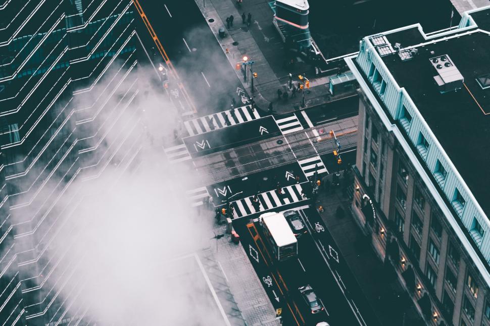 Free Image of Aerial view of city street with rising steam 