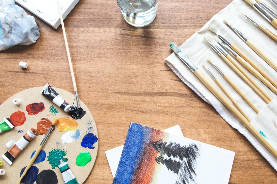 Free Image of Artist s paintbrushes and color palette 
