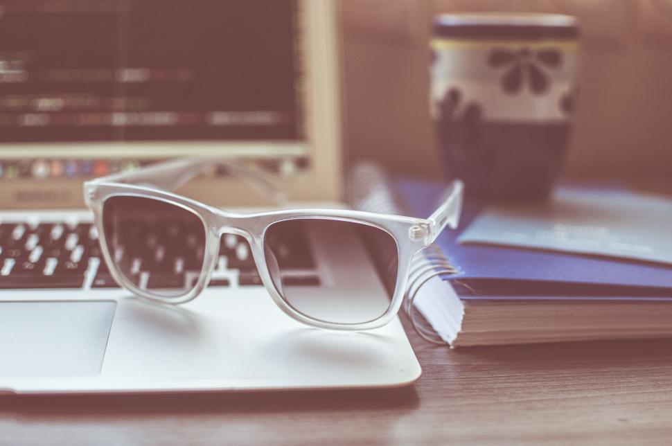 Free Image of Vintage-style work desk with open laptop 