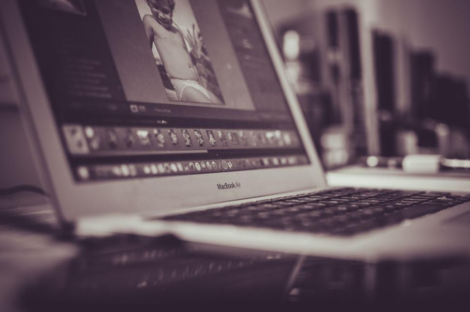 Free Image of Laptop screen displaying photo editing 