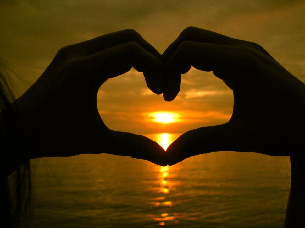 Free Image of Person Making Heart Shape With Hands 