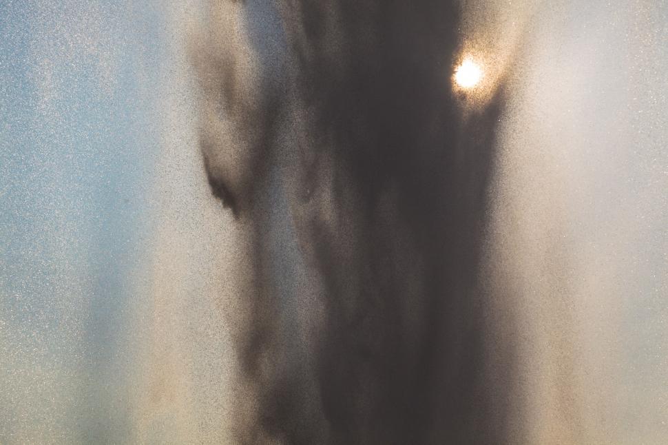 Free Image of A wall of falling water and sun 