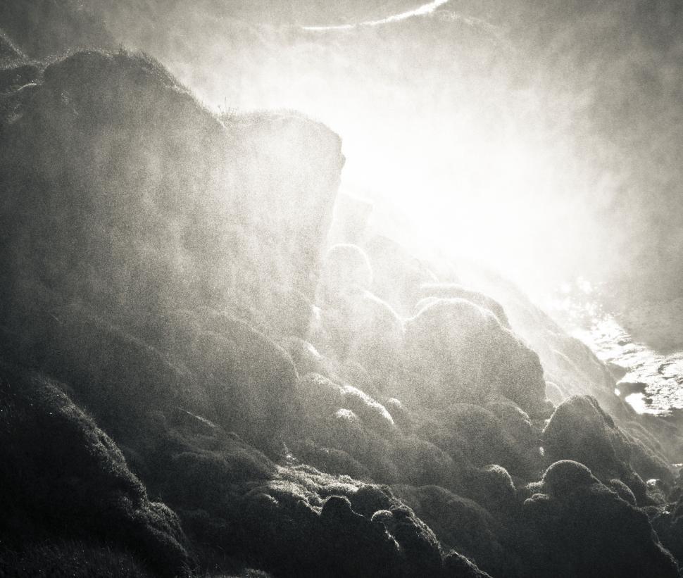 Free Image of A black and white photo of rocks and water 