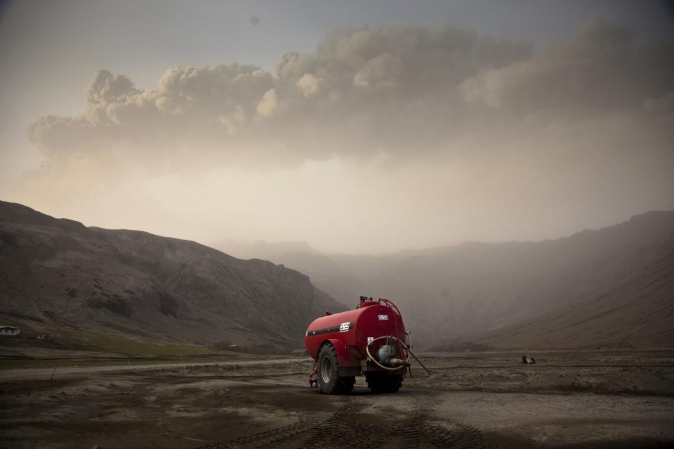 Free Image of A red tank on a dirt road 