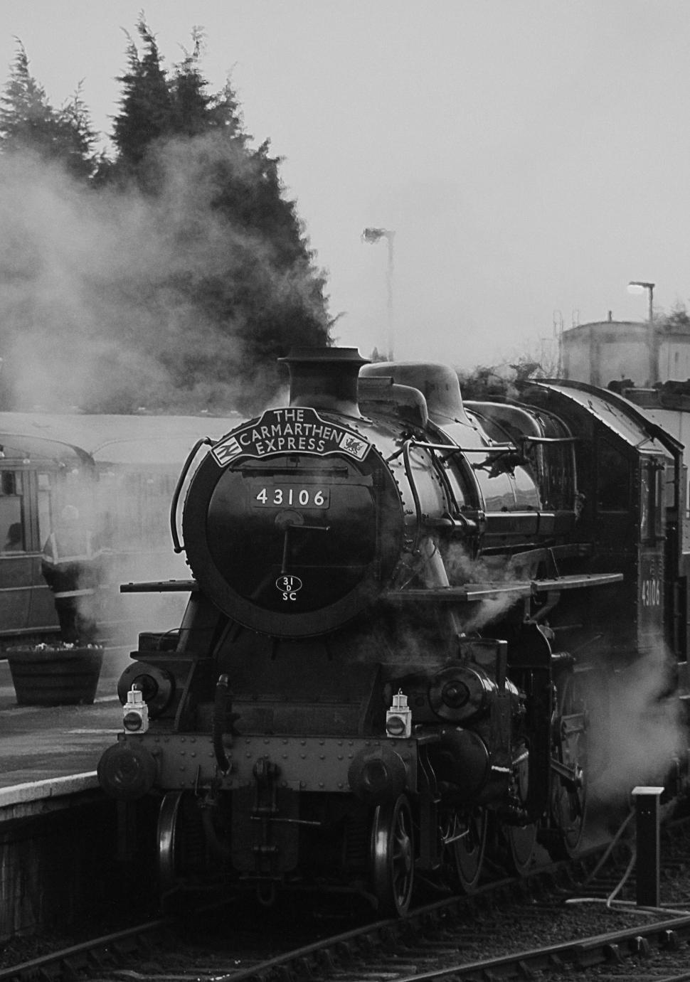 Free Image of Vintage black and white steam locomotive 