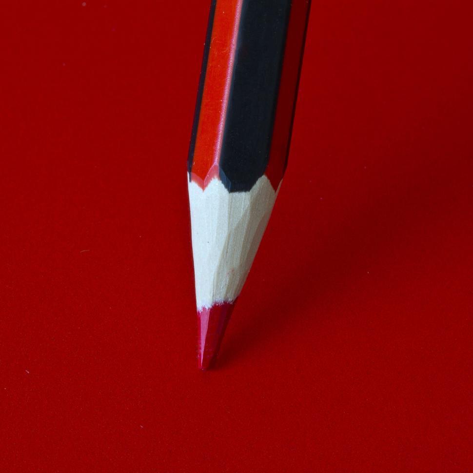 Free Image of Close-up of pencil tip on a red background 