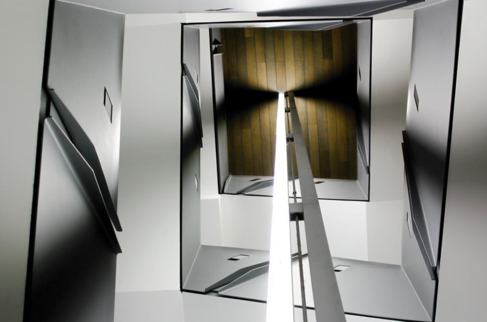 Free Image of Abstract geometric interior with light patterns 