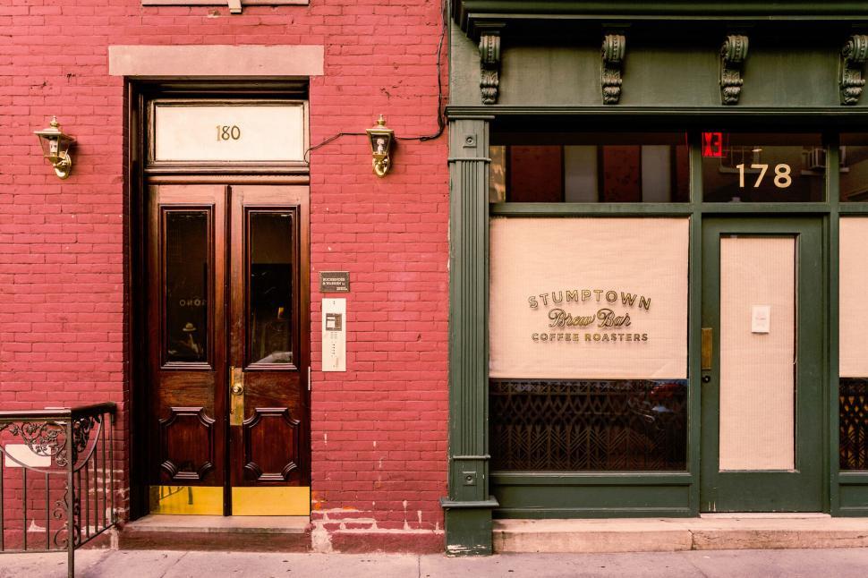 Free Image of Quaint red building with charming entrance 