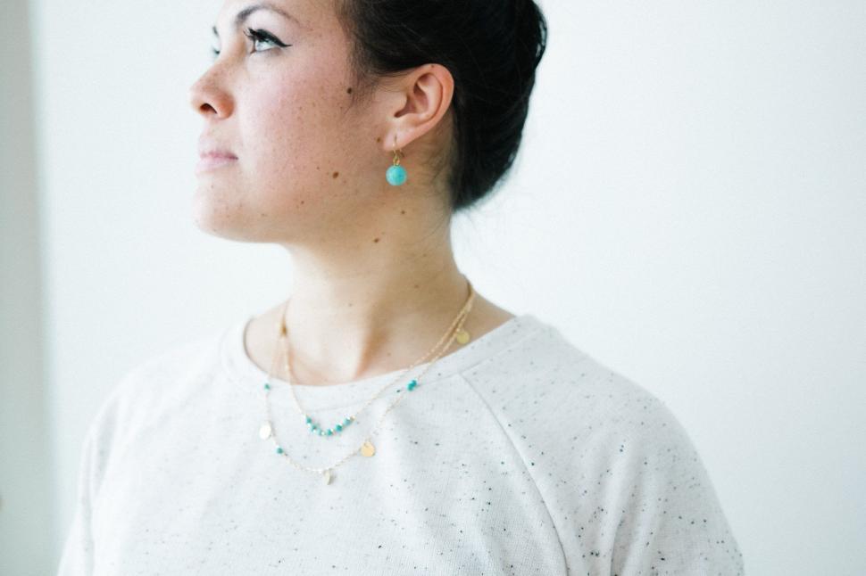 Free Image of Woman with face obscured simple clothing 