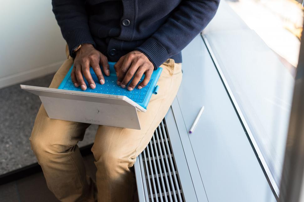 Free Image of Casual work on a tablet in a bright modern space 