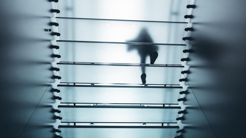 Free Image of Silhouette of a person behind frosted glass 