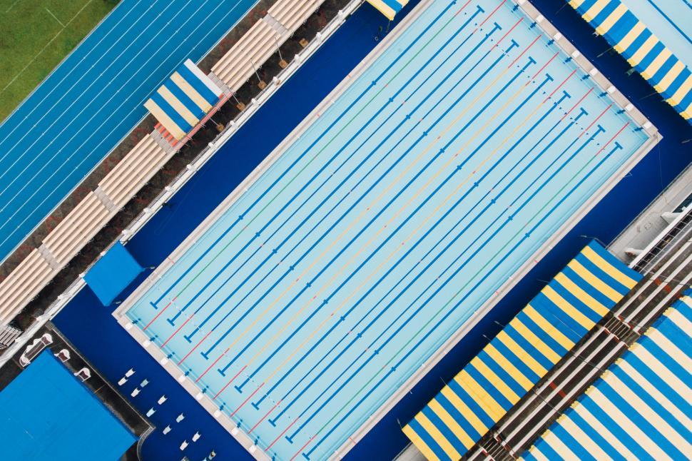 Free Image of Top view of a swimming pool and starting blocks 