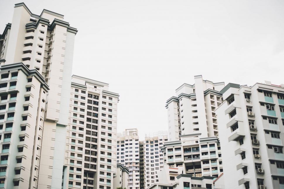 Free Image of High-rise residential apartments cloudy sky 