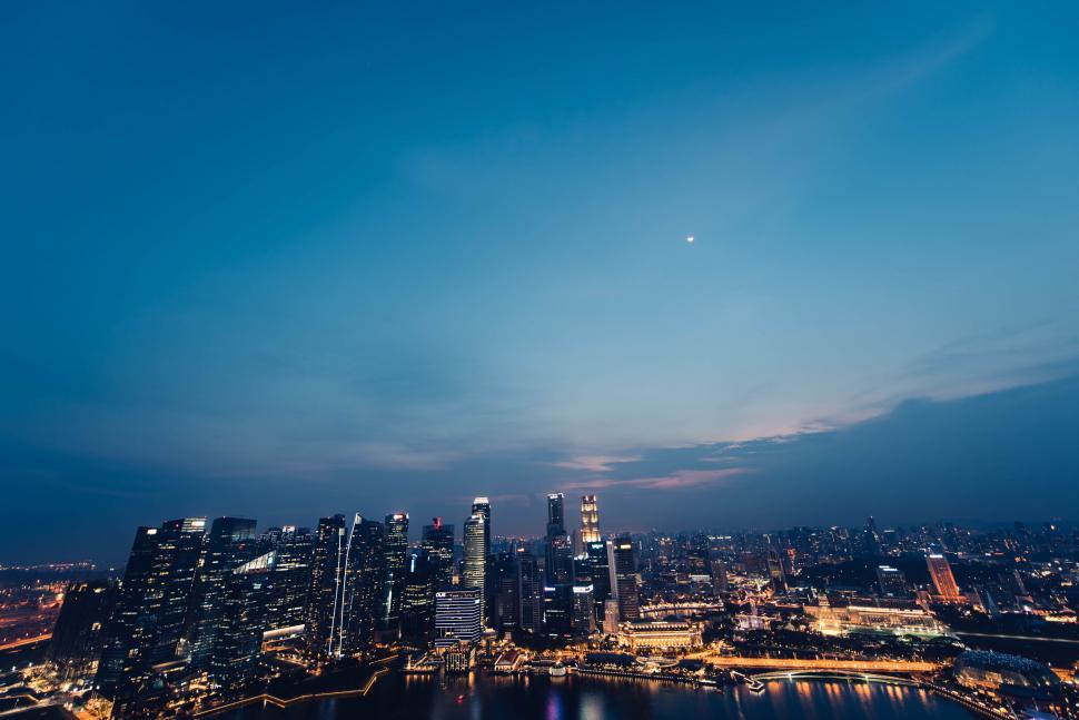 Free Image of Twilight cityscape with illuminated buildings 