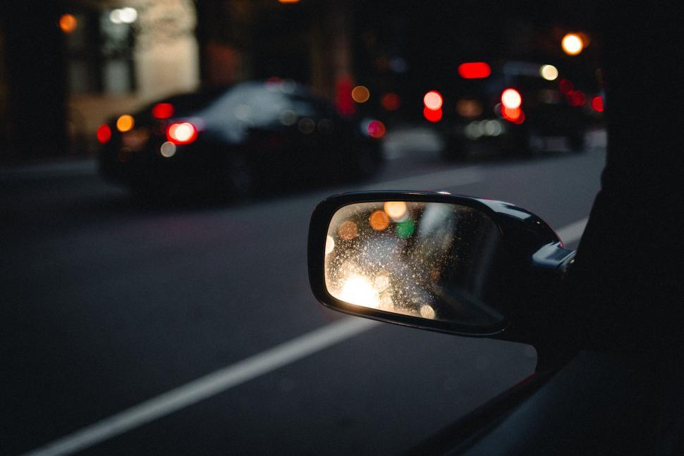 Free Image of Traffic viewed through car side mirror 